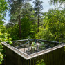 edelførst tree houses Roof terrace The tower house, © Robert Tober Tree house with terrace in a forest.