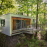 House on the foundation, © Robert Tober Modern tree house with terrace in the forest.